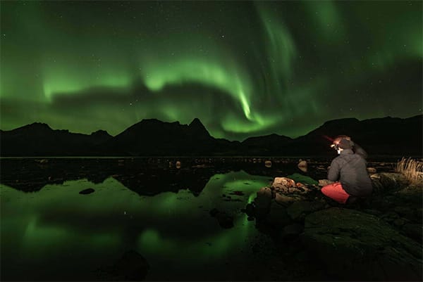 Northern Lights guide Chris, enjoying an aurora display
