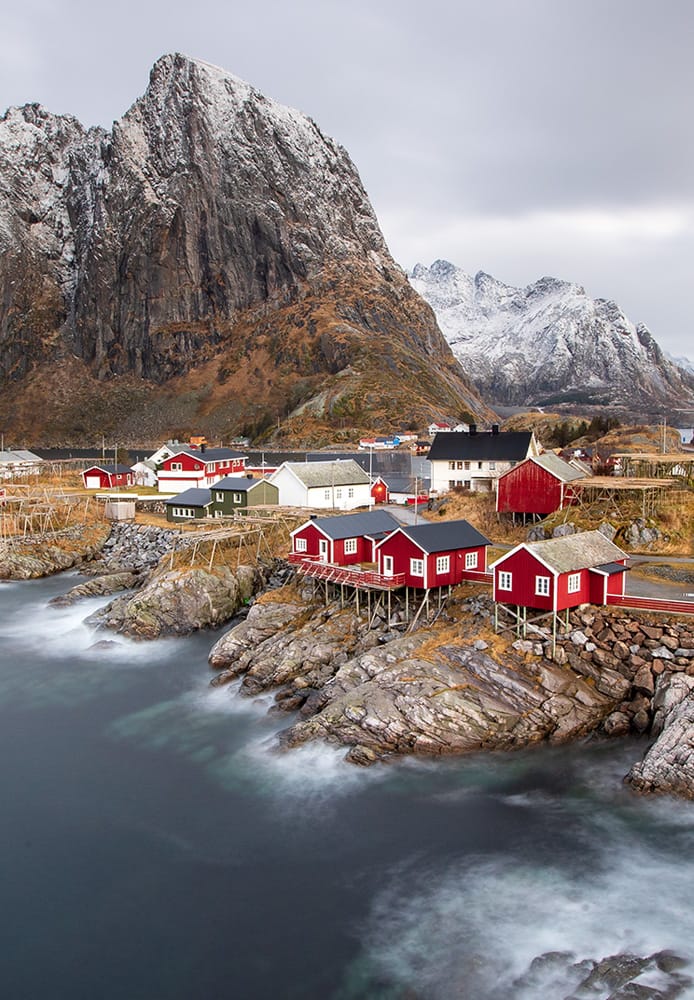 Traditional red rorbuer fishing cabins in Hamnøy, a scenic and iconic stop on our photography tour