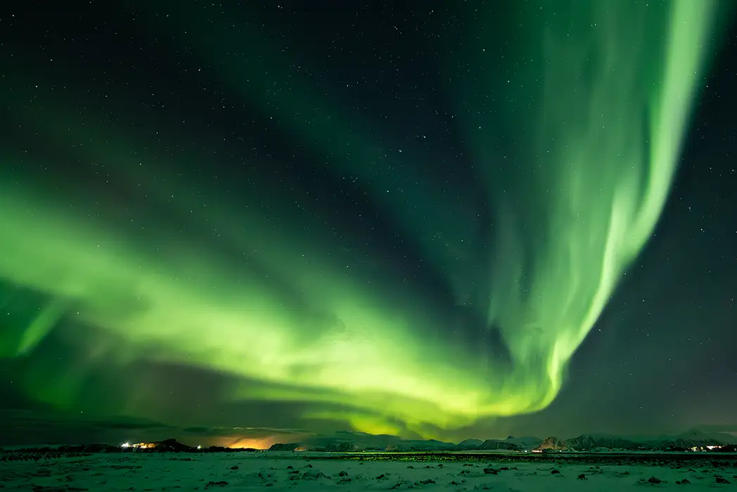 Join our guided photography tour and witness the spectacular Northern Lights in the Arctic